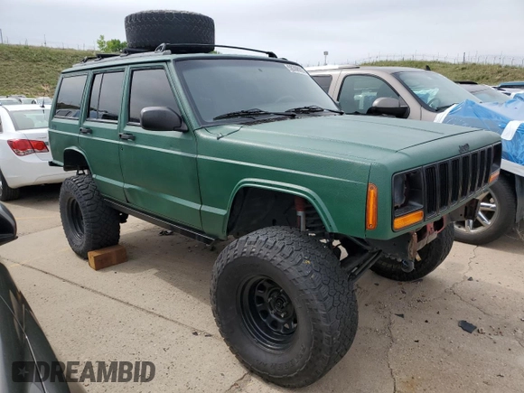 1998 Jeep Cherokee Sport with VIN 1J4FJ68SXWL210381, listed as a Copart auction lot 58398995 with 211,870 mi miles and Salvage title. Bid and sale history available at DreamBid. Image 4.