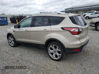 2017 Ford Escape Titanium with VIN 1FMCU0J98HUD75004, listed as a Copart auction lot 51627805 with 74,166 mi miles and Salvage Title. Bid and sale history available at carsss.com. Image 2.