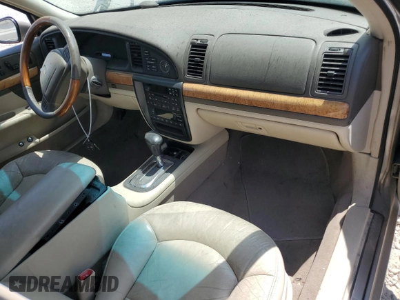 2001 Lincoln Continental z VIN 1LNHM97V21Y698784, wystawiony jako Copart lot #64040134 z przebiegiem Nie podano mil oraz Szkoda całkowita • Salvage title. Historia ofert i sprzedaży dostępna na DreamBid. Obrazek 8.
