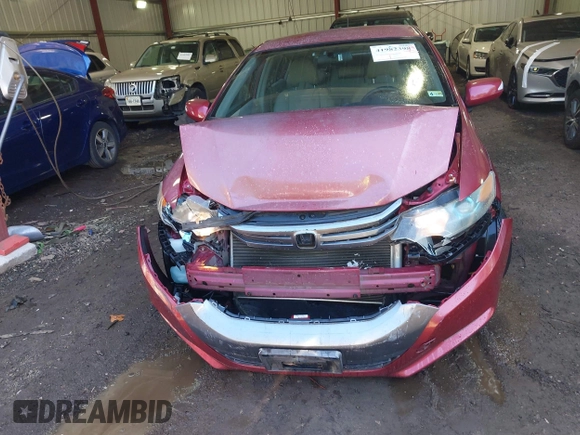 2010 Honda Insight EX z VIN JHMZE2H7XAS001280, wystawiony jako IAAI lot #41982398 z przebiegiem 142 434 mil mil oraz . Historia ofert i sprzedaży dostępna na DreamBid. Obrazek 12.