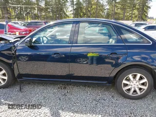2008 Ford Taurus SEL with VIN 1FAHP24W98G140677, listed as a IAAI auction lot 42087217 with 151,693 mi miles. Bid and sale history available at carsss.com. Image 14.