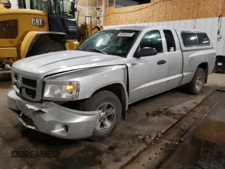 2010 Dodge Dakota z VIN 1D7CW2BK3AS184268, wystawiony jako Copart lot #48260235 z przebiegiem 60 542 mil mil oraz Szkoda całkowita • Salvage title. Historia ofert i sprzedaży dostępna na DreamBid. Obrazek 1.