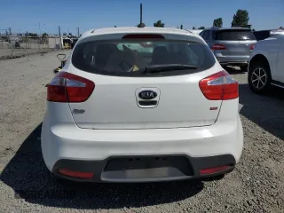 2014 Kia Rio LX with VIN KNADM5A37E6359133, listed as a Copart auction lot 64278274 with Not Provided miles and Salvage Title. Bid and sale history available at carsss.com. Image 6.