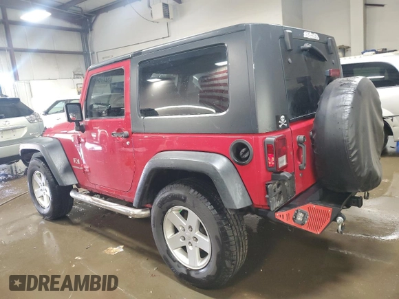 2008 Jeep Wrangler X with VIN 1J4FA24118L501599, listed as a Copart auction lot 52776475 with 74,186 mi miles and Salvage Title. Bid and sale history available at DreamBid. Image 2.