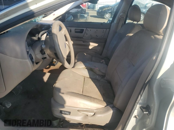 2004 Ford Taurus z VIN 1FAFP59SX4A141848, wystawiony jako Copart lot #79389104 z przebiegiem Nie podano mil oraz Nie do naprawy. Historia ofert i sprzedaży dostępna na DreamBid. Obrazek 7.