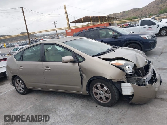 2004 Toyota Prius with VIN JTDKB20U240052320, listed as a IAAI auction lot 42023219 with 177,884 mi miles. Bid and sale history available at carsss.com. Image 13.