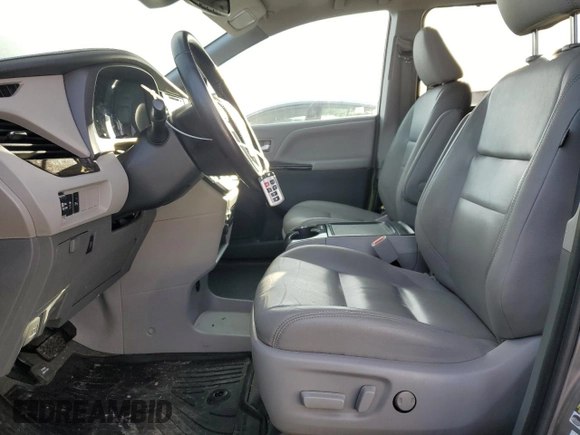 2020 Toyota Sienna XLE with VIN 5TDDZ3DC0LS243886, listed as a Copart auction lot 43464265 with 77,404 mi miles and Salvage title. Bid and sale history available at DreamBid. Image 7.
