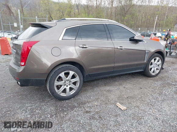 2014 Cadillac SRX Performance Collection with VIN 3GYFNCE33ES570472, listed as a IAAI auction lot 41971511 with 200,811 mi miles. Bid and sale history available at carsss.com. Image 4.