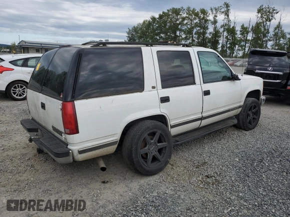 1999 Chevrolet Tahoe Z71 with VIN 1GNEK13R1XJ365475, listed as a Copart auction lot 56258175 with 184,647 mi miles and Clean Title. Bid and sale history available at DreamBid. Image 3.