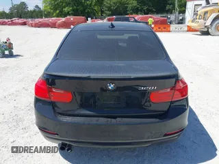 2013 BMW 3 Series 328i with VIN WBA3C1C57DF434854, listed as a IAAI auction lot 42023257 with 125,960 mi miles and . Bid and sale history available at carsss.com. Image 16.