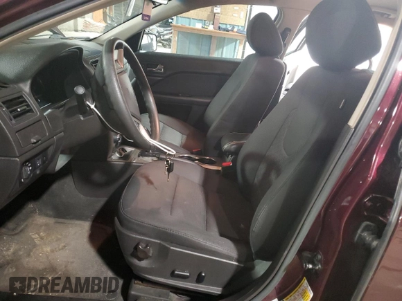 2012 Ford Fusion SE with VIN 3FAHP0HA0CR377773, listed as a Copart auction lot 57278885 with 133,700 mi miles and Salvage title. Bid and sale history available at DreamBid. Image 7.