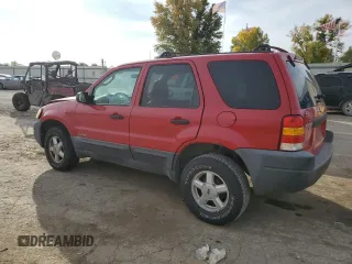 2002 Ford Escape XLS Value with VIN 1FMYU01B82KC15443, listed as a Copart auction lot 77998164 with 212,313 mi miles and Salvage title. Bid and sale history available at DreamBid. Image 2.