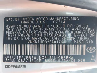 2015 Toyota Yaris L with VIN VNKKTUD32FA017551, listed as a IAAI auction lot 41267892 with 122,506 mi miles. Bid and sale history available at carsss.com. Image 9.