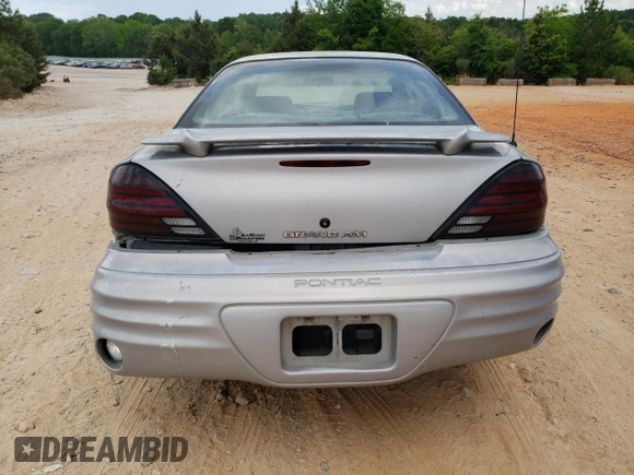 1999 Pontiac Grand Am z VIN 1G2NE12E3XM901263, wystawiony jako Copart lot #55723445 z przebiegiem 163 946 mil mil oraz Szkoda całkowita • Salvage title. Historia ofert i sprzedaży dostępna na DreamBid. Obrazek 6.