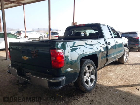 2015 Chevrolet Silverado 1500 LT with VIN 1GCRCREC6FZ161835, listed as a IAAI auction lot 41516896 with 206,305 mi miles. Bid and sale history available at carsss.com. Image 4.