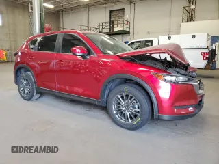 2017 Mazda CX-5 Touring with VIN JM3KFACL5H0176922, listed as a Copart auction lot 53250515 with 69,261 mi miles and Salvage Title. Bid and sale history available at carsss.com. Image 4.