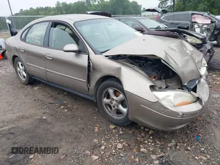 2002 Ford Taurus SES Standard z VIN 1FAFP55U42A198213, wystawiony jako IAAI lot #42329554 z przebiegiem 149 587 mil mil oraz . Historia ofert i sprzedaży dostępna na DreamBid. Obrazek 1.