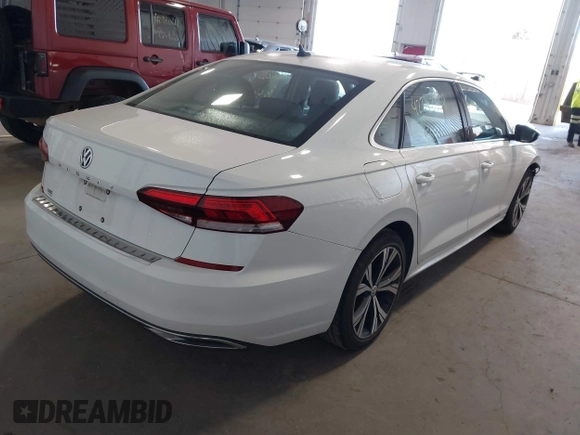 2021 Volkswagen Passat SE with VIN 1VWSA7A30MC014179, listed as a IAAI auction lot 42342358 with 77,535 mi miles and . Bid and sale history available at DreamBid. Image 4.