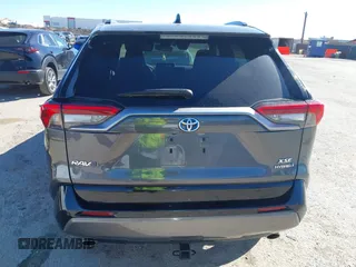 2021 Toyota RAV4 Hybrid XSE with VIN 4T3E6RFV5MU057078, listed as a IAAI auction lot 41718381 with 65,797 mi miles. Bid and sale history available at carsss.com. Image 16.