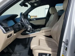 2021 BMW X7 xDrive40i with VIN 5UXCW2C00M9F64057, listed as a Copart auction lot 51298195 with 67,097 mi miles and Salvage Title. Bid and sale history available at carsss.com. Image 7.