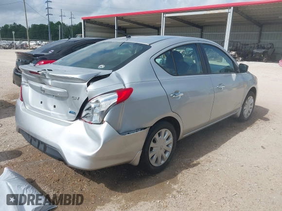2016 Nissan Versa S Plus with VIN 3N1CN7AP1GL860010, listed as a IAAI auction lot 42059736 with 122,622 mi miles. Bid and sale history available at carsss.com. Image 4.