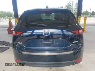 2019 Mazda CX-5 Grand Touring with VIN JM3KFBDM6K0522903, listed as a IAAI auction lot 42583005 with 61,174 mi miles and . Bid and sale history available at DreamBid. Image 17.