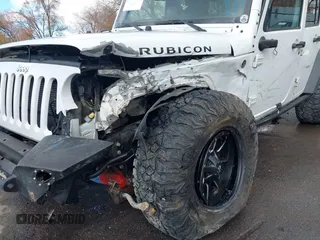 2014 Jeep Wrangler Unlimited Rubicon with VIN 1C4BJWFG2EL264792, listed as a IAAI auction lot 40938380 with 145,886 mi miles. Bid and sale history available at carsss.com. Image 6.