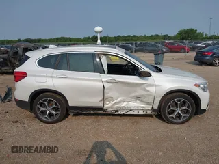 2017 BMW X1 xDrive28i with VIN WBXHT3C39H5F84338, listed as a IAAI auction lot 42400168 with 48,673 mi miles and . Bid and sale history available at DreamBid. Image 14.
