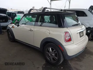 2013 MINI Hardtop with VIN WMWSU3C53DT684999, listed as a IAAI auction lot 42163800 with 89,774 mi miles and . Bid and sale history available at DreamBid. Image 3.