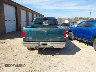 1999 Ford Super Duty F-250 XL with VIN 1FTNW21S2XEE10313, listed as a IAAI auction lot 41825300 with 150,619 mi miles. Bid and sale history available at carsss.com. Image 16.