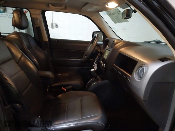 2014 Jeep Patriot High Altitude with VIN 1C4NJPFAXED679271, listed as a IAAI auction lot 41290600 with 157,256 mi miles and . Bid and sale history available at carsss.com. Image 5.