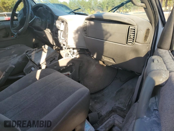 2003 GMC Safari z VIN 1GKDM19X93B516849, wystawiony jako Copart lot #82296404 z przebiegiem Nie podano mil oraz Szkoda całkowita • Salvage title. Historia ofert i sprzedaży dostępna na DreamBid. Obrazek 8.