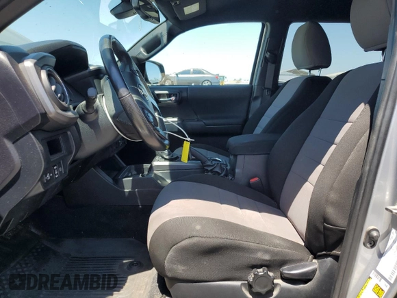 2018 Toyota Tacoma SR with VIN 3TMCZ5AN6JM129370, listed as a Copart auction lot 63042425 with 65,189 mi miles and Salvage title. Bid and sale history available at DreamBid. Image 7.
