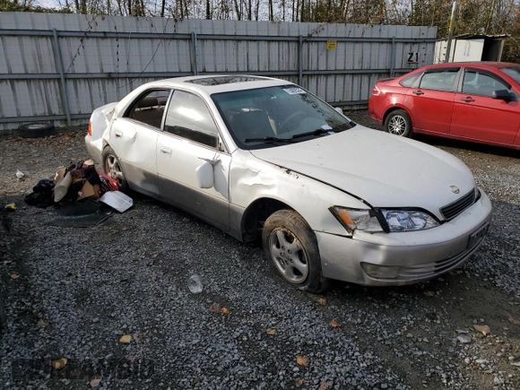 1997 Lexus ES 300 Luxury Sport Sdn with VIN JT8BF22GXV0045837, listed as a Copart auction lot 75062524 with 294,766 mi miles and Salvage Title. Bid and sale history available at carsss.com. Image 4.