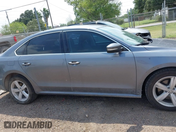 2013 Volkswagen Passat SE z VIN 1VWBH7A32DC011750, wystawiony jako IAAI lot #42199020 z przebiegiem 155 806 mil mil oraz . Historia ofert i sprzedaży dostępna na DreamBid. Obrazek 13.
