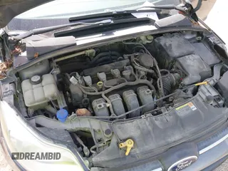2013 Ford Focus SE with VIN 1FADP3F23DL131327, listed as a IAAI auction lot 42577474 with 146,412 mi miles and . Bid and sale history available at DreamBid. Image 10.