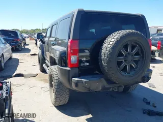 2006 Hummer H3 with VIN 5GTDN136768275733, listed as a IAAI auction lot 41841767 with 91,113 mi miles. Bid and sale history available at carsss.com. Image 3.