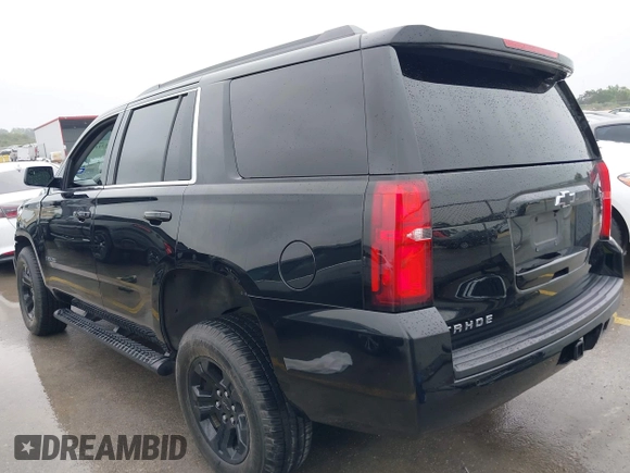 2020 Chevrolet Tahoe LS with VIN 1GNSCAKC5LR275173, listed as a IAAI auction lot 41931311 with 86,780 mi miles and . Bid and sale history available at DreamBid. Image 3.