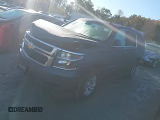 2019 Chevrolet Suburban LT with VIN 1GNSCHKC9KR327072, listed as a IAAI auction lot 40852032 with 109,815 mi miles and . Bid and sale history available at DreamBid. Image 2.