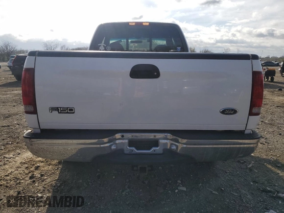 2000 Ford F-150 XL with VIN 2FTRX18L2YCA44464, listed as a Copart auction lot 51081335 with Not provided miles and Salvage title. Bid and sale history available at DreamBid. Image 6.