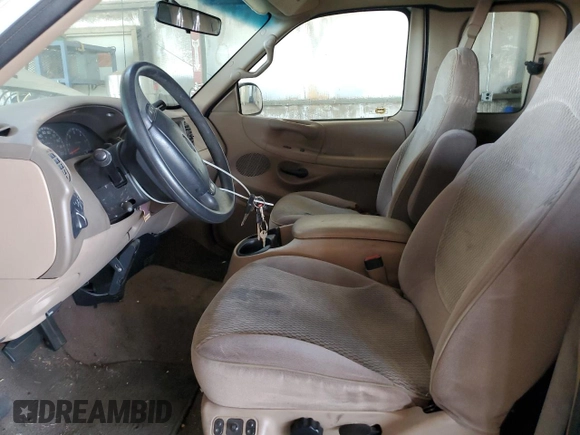 1998 Ford F-150 с VIN 1FTRX18L0WKA53124, выставлен на аукционе Copart как лот 66466945 с пробегом 252 908 миль миль и Чистый • Clean title. История ставок и продаж доступна на DreamBid. Изображение 7.