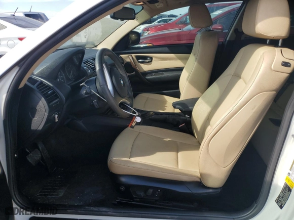 2012 BMW 1 Series 128i with VIN WBAUP7C52CVP22295, listed as a Copart auction lot 69062424 with 39,321 mi miles and Salvage Title. Bid and sale history available at carsss.com. Image 7.