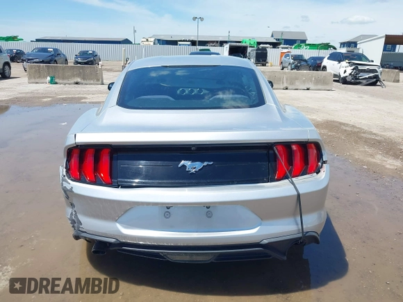 2018 Ford Mustang EcoBoost with VIN 1FA6P8THXJ5128830, listed as a IAAI auction lot 42192673 with 58,817 mi miles and . Bid and sale history available at DreamBid. Image 17.