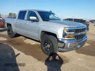 2018 Chevrolet Silverado 1500 LT with VIN 3GCPCREC9JG574686, listed as a IAAI auction lot 41676124 with 74,239 mi miles and . Bid and sale history available at DreamBid. Image 1.