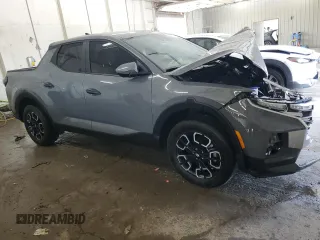 2024 Hyundai Santa Cruz SEL z VIN 5NTJBDDE8RH117547, wystawiony jako Copart lot #62145825 z przebiegiem 10 835 mil mil oraz Szkoda całkowita • Salvage title. Historia ofert i sprzedaży dostępna na DreamBid. Obrazek 4.