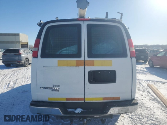 2014 Chevrolet Express Cargo Van with VIN 1GCWGFCB2E1114900, listed as a Copart auction lot 46157065 with 143,434 mi miles and Clean Title. Bid and sale history available at carsss.com. Image 6.