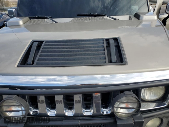 2005 Hummer H2 SUV z VIN 5GRGN23U65H106597, wystawiony jako Copart lot #54508345 z przebiegiem Nie podano mil oraz Szkoda całkowita • Salvage title. Historia ofert i sprzedaży dostępna na DreamBid. Obrazek 11.