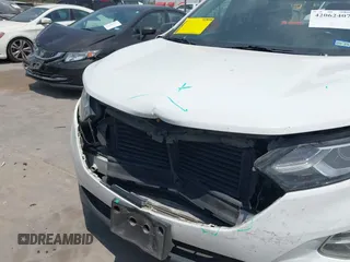 2018 Chevrolet Equinox LT with VIN 2GNAXJEV4J6312574, listed as a IAAI auction lot 42062407 with 126,106 mi miles and . Bid and sale history available at DreamBid. Image 6.
