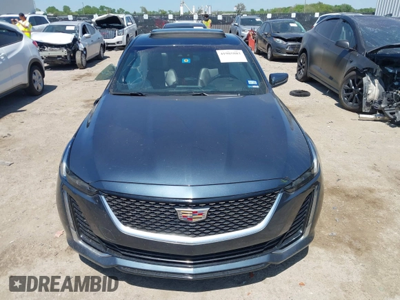 2021 Cadillac CT5 Luxury z VIN 1G6DW5RKXM0144424, wystawiony jako IAAI lot #41985803 z przebiegiem 65 555 mil mil oraz . Historia ofert i sprzedaży dostępna na DreamBid. Obrazek 12.