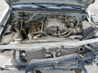 2004 Nissan Frontier XE Desert Runner with VIN 1N6ED26Y44C402138, listed as a Copart auction lot 58828425 with 125,143 mi miles and Salvage title. Bid and sale history available at DreamBid. Image 11.